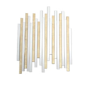 Decorative wall art with vertical wooden and metallic sticks on a white background